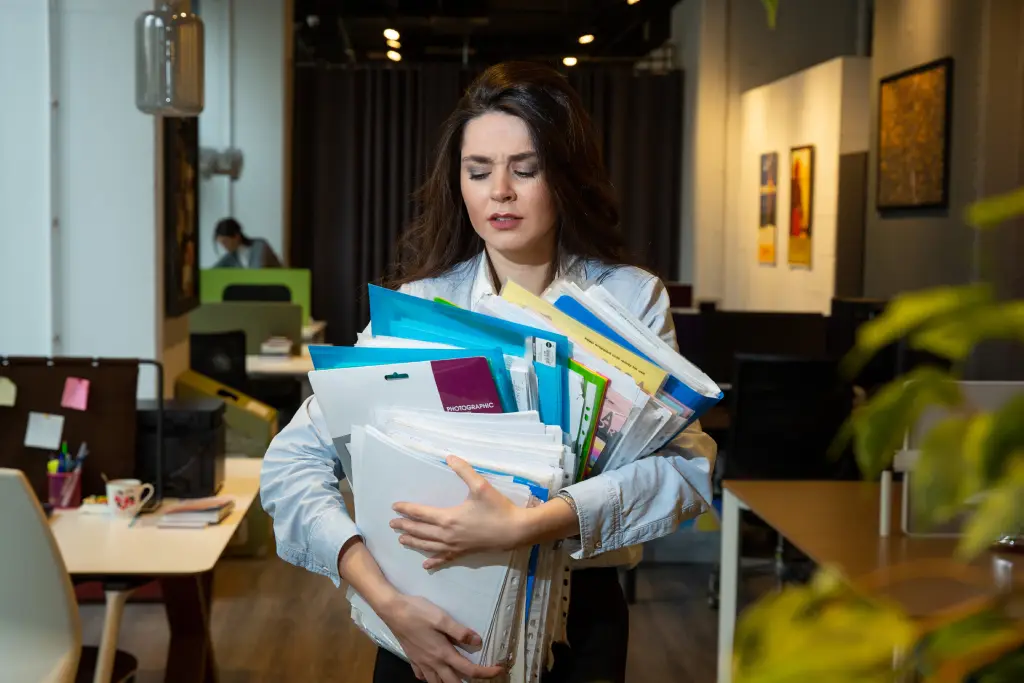 employee struggling for the lack of good filing system