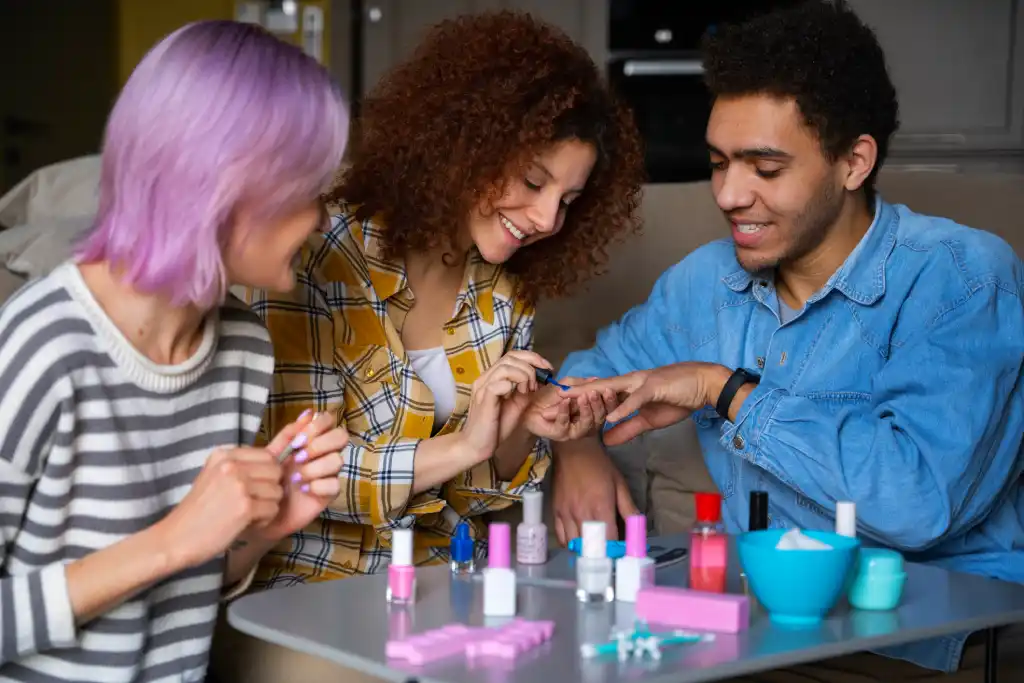 nail technician working with clients