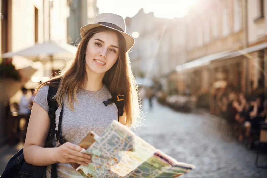 Traveler exploring a UK city, representing careers and salaries in the UK tour guiding industry.