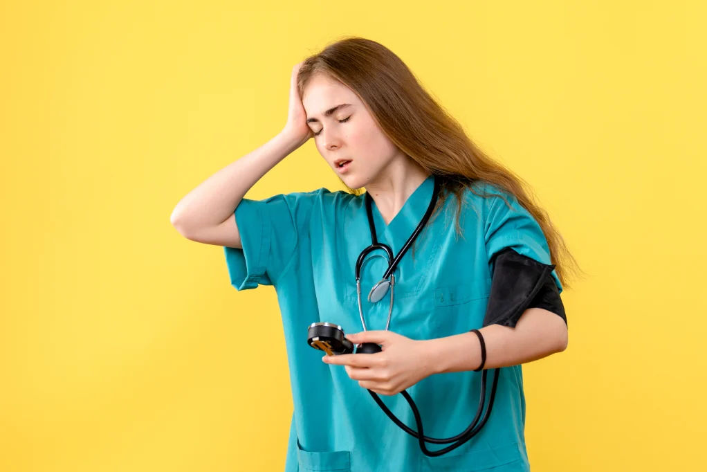 Healthcare worker experiencing most painful stage of pressure sores